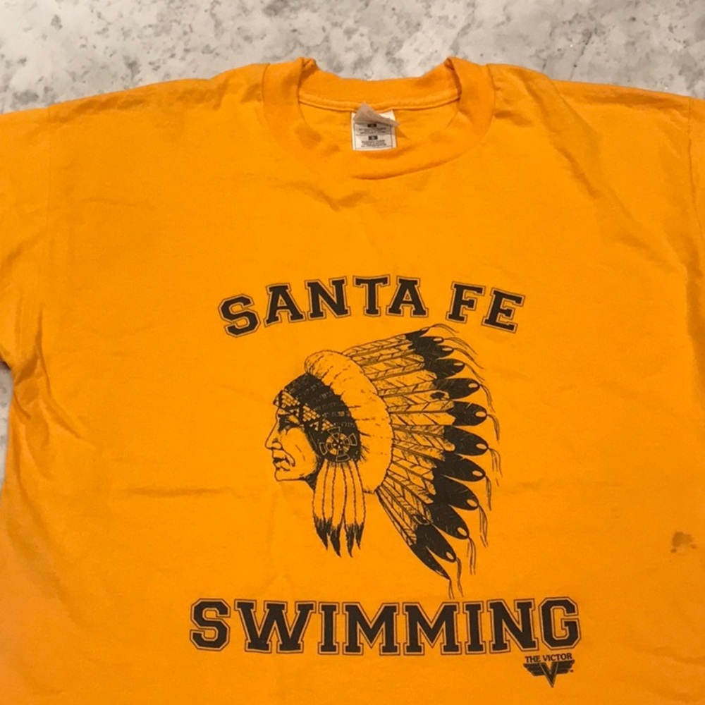 Vintage Graphic Tee Shirt. Size Large. Golden yellow color.